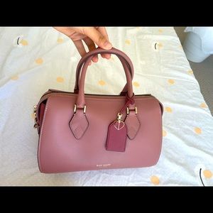 Super cute Kate Spade duffle bag! Great for work bags or hangout bag.